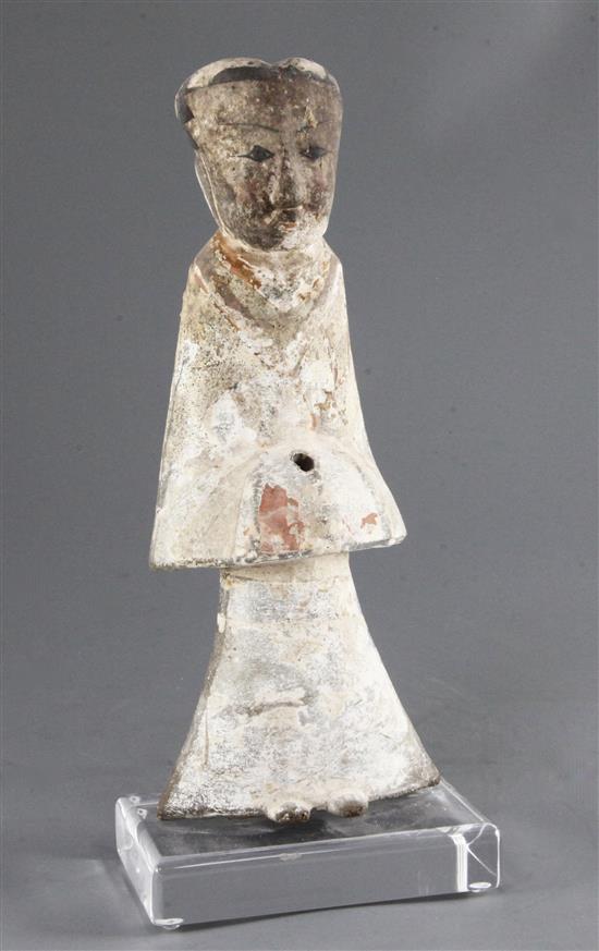 A Chinese polychrome painted pottery standing figure of an official, Han dynasty (206BC-220AD), height 29.5cm, modern stand